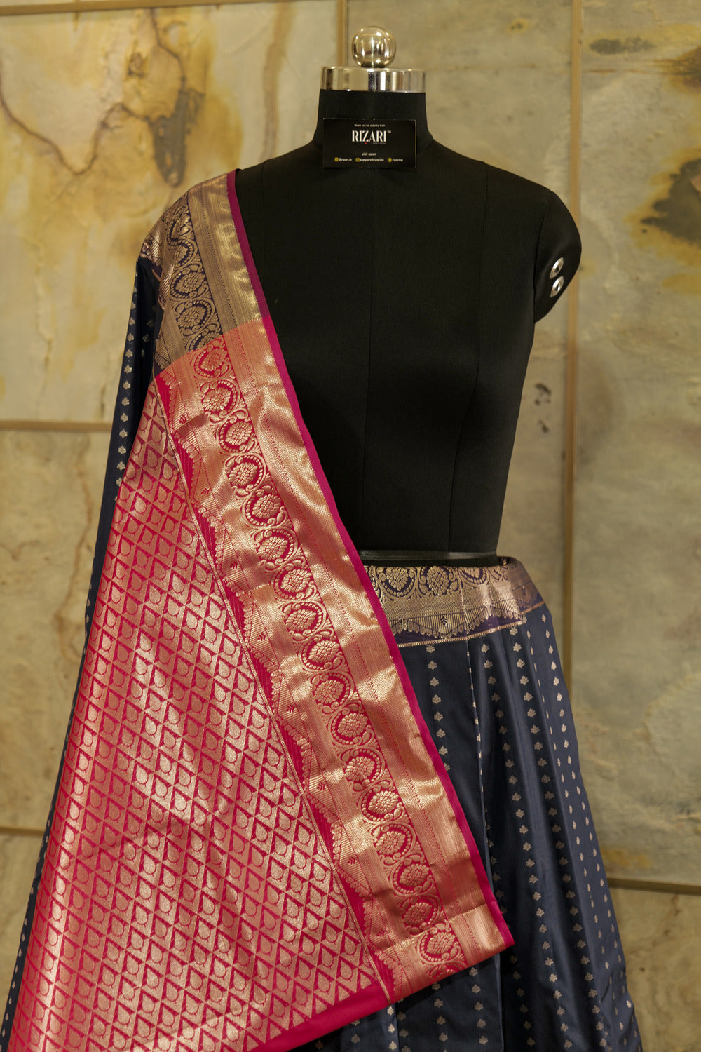 Navy blue Kanchi silk saree with contrast pink Pallu and blouse rich jacquard borders