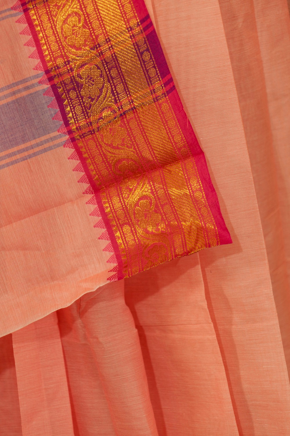 Peach  Chettinad cotton saree  with Ganga Jamuna temple borders with buttas in pink and purple