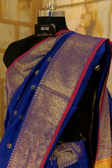 Purple Maheshwari Cotton with Jari buttas all over and broad borders on both the sides