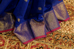 Purple Maheshwari Cotton with Jari buttas all over and broad borders on both the sides