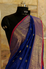 Purple Maheshwari Cotton with Jari buttas all over and broad borders on both the sides