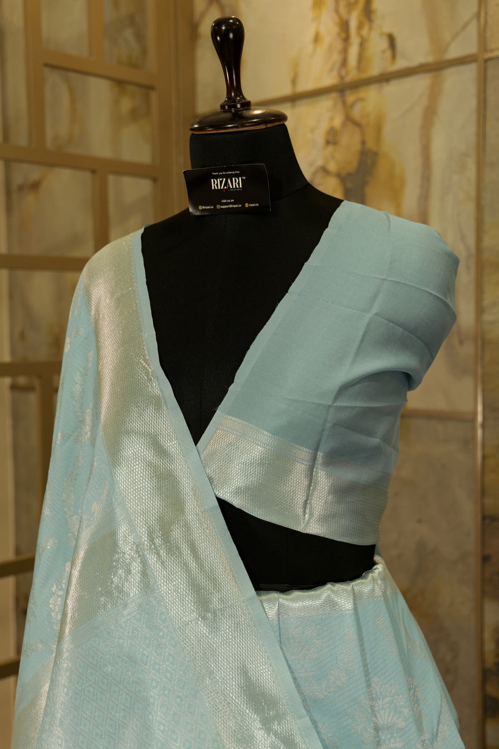 Light blue soft silk saree with silver weaving all over body with borders