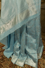 Light blue soft silk saree with silver weaving all over body with borders