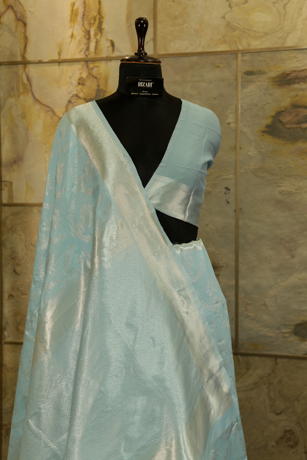 Light blue soft silk saree with silver weaving all over body with borders