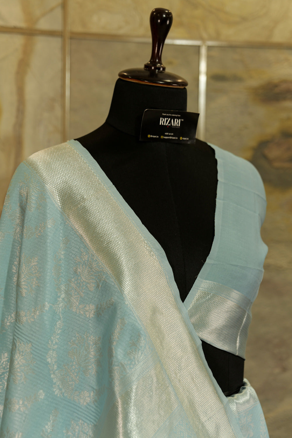 Light blue soft silk saree with silver weaving all over body with borders