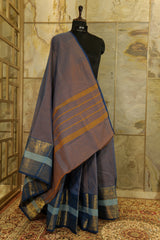 Dual tone Blue chettinad cotton saree with one sided broad boarder with peacock and traditional floral designs in gold