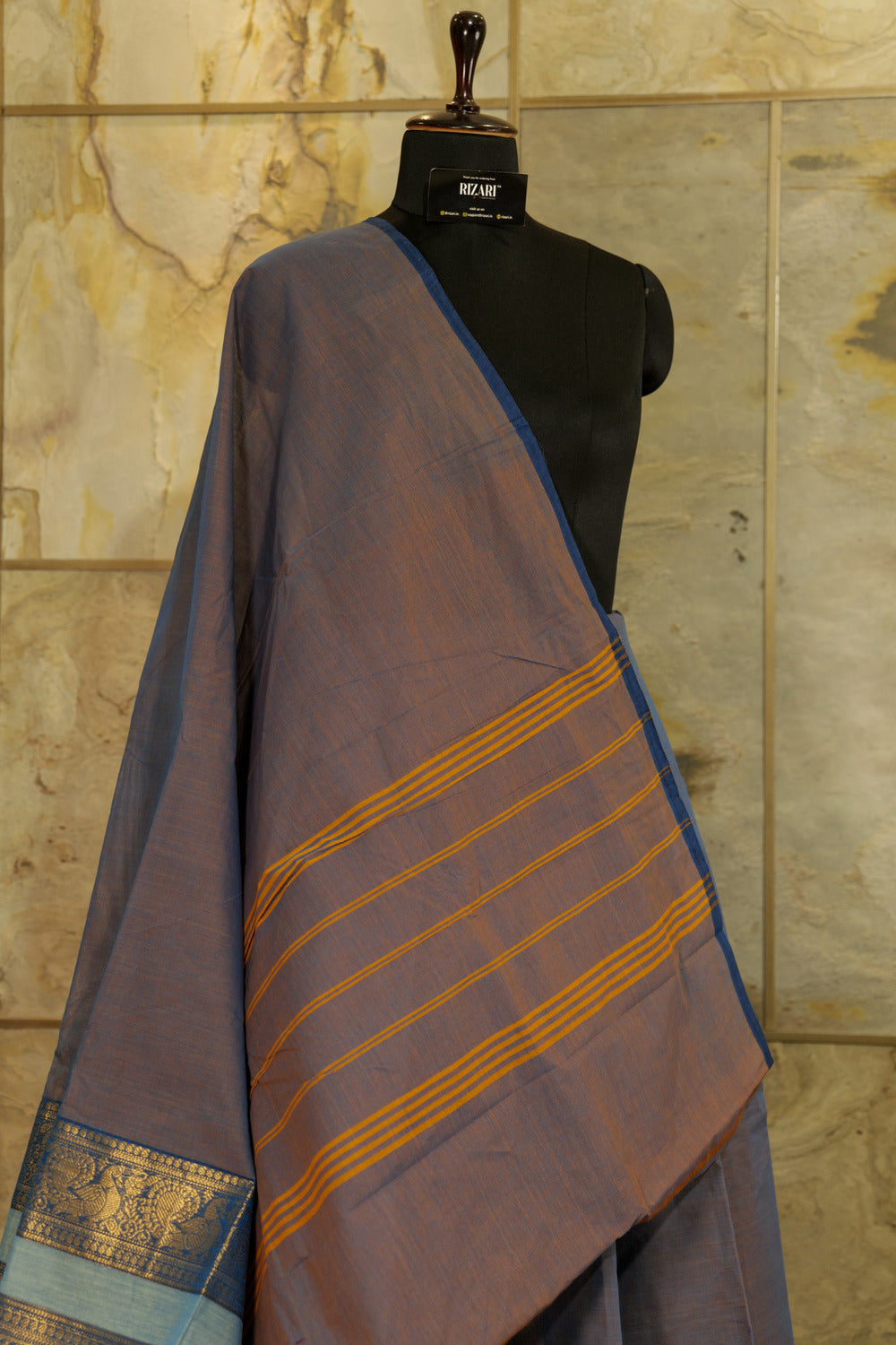 Dual tone Blue chettinad cotton saree with one sided broad boarder with peacock and traditional floral designs in gold