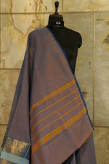 Dual tone Blue chettinad cotton saree with one sided broad boarder with peacock and traditional floral designs in gold