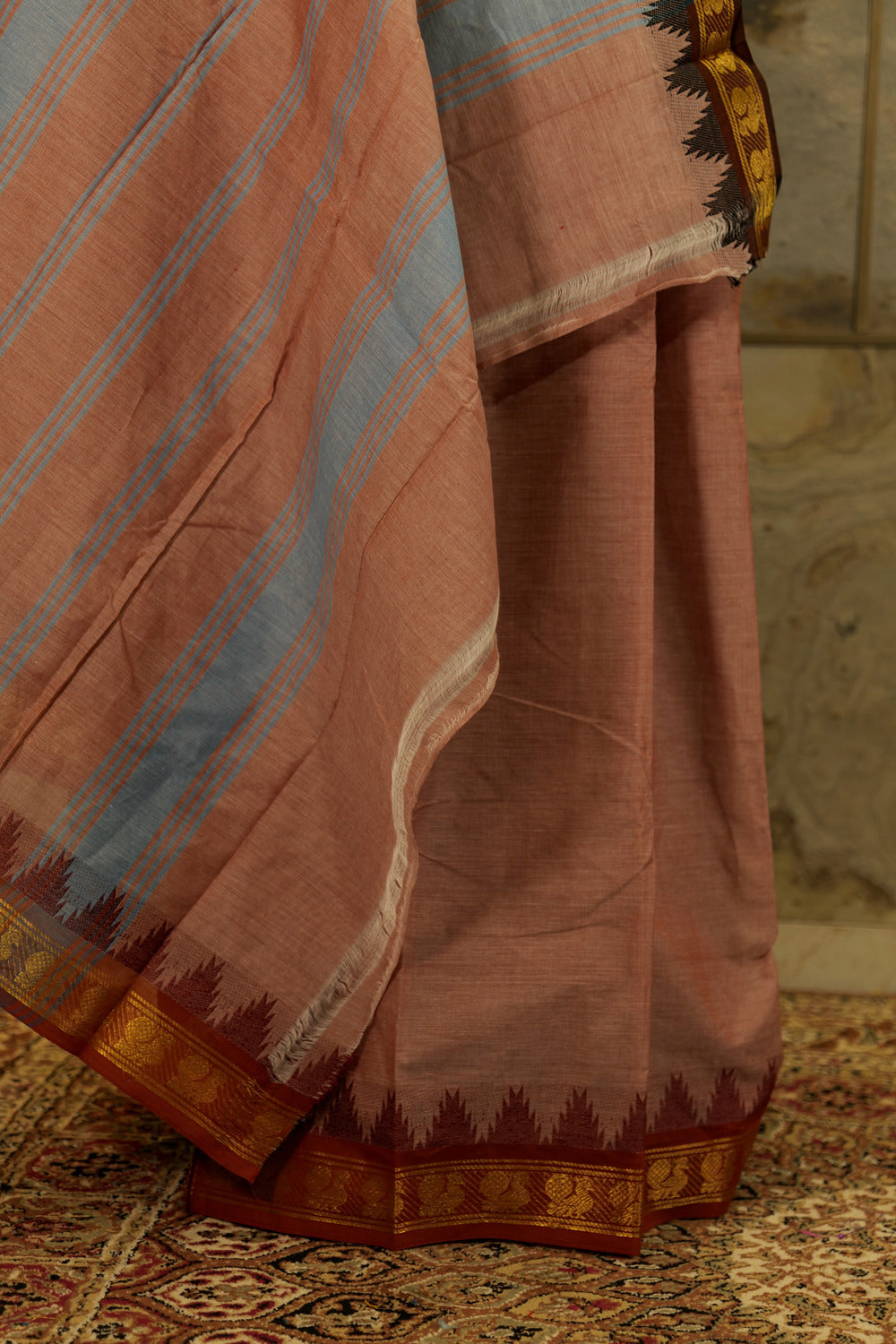 Light brown chettinad cotton saree with ganga jamuna borders with delicate peacock motifs & temple border design