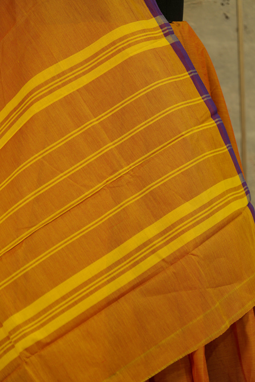 Dual tone Orange-purple chettinad cotton saree with broad Jari border with beautiful peacock figures woven on one border