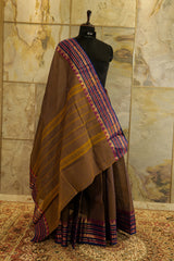 Dual toned brown-orange chettinad cotton saree with purple contrast temple borders on both the sides