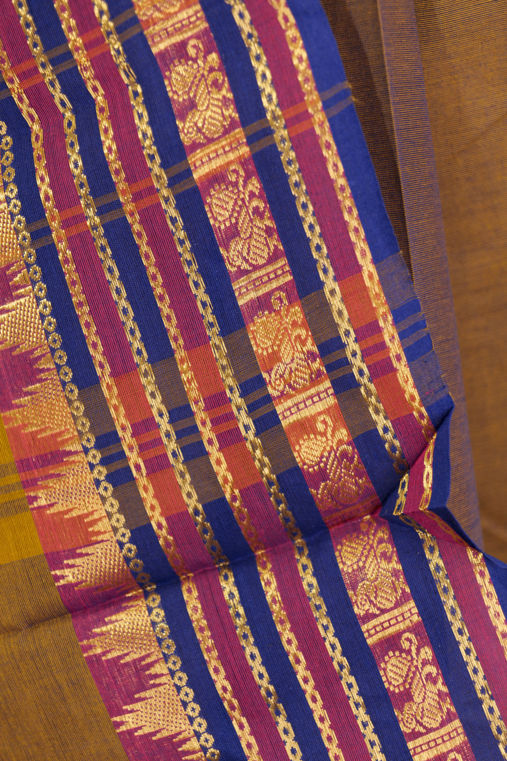 Dual toned brown-orange chettinad cotton saree with purple contrast temple borders on both the sides