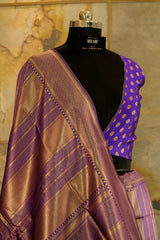 Purple banarasi pattern lining all over , Butti weaving on blouse piece in same purple color