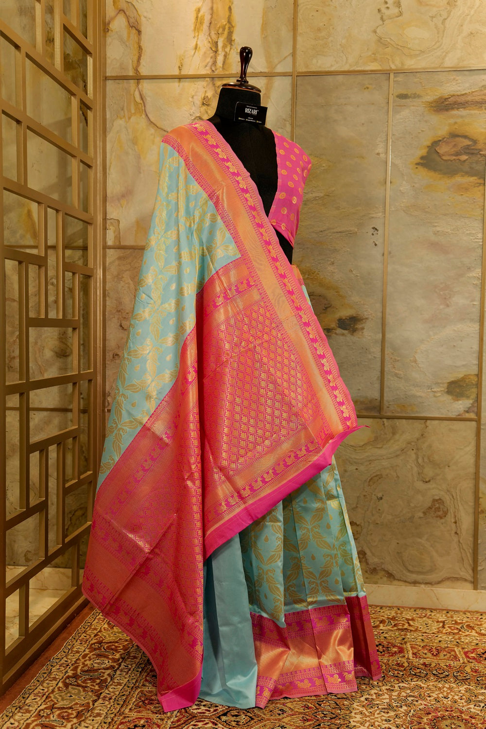 pastel blue soft banarasi pattern saree with woven peacock motifs all over - pink contrast Pallu and border