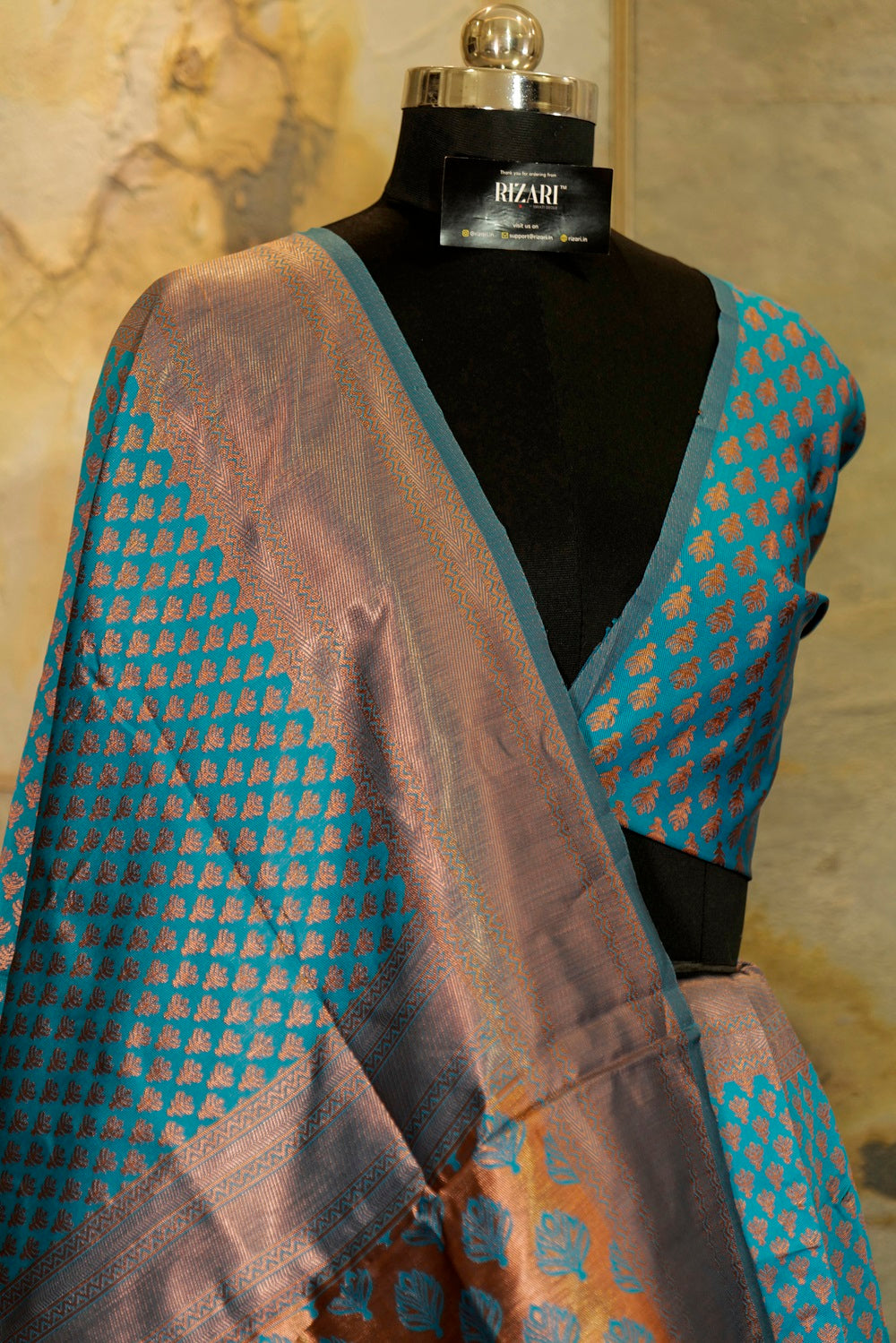 Peacock blue banarasi pattern with copper buttas weaving all over with brocade blouse piece and Pallu